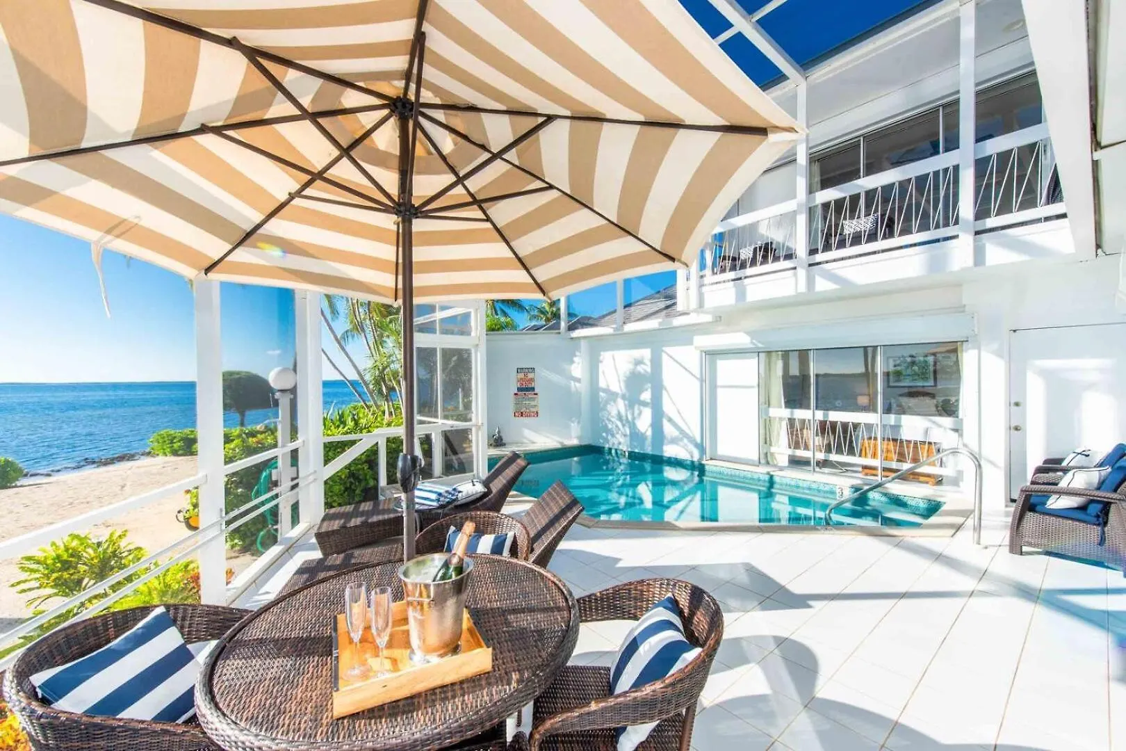 Pools Of The Kai 6 - Beachfront Condo With Private Pool Atrium, Modern Kitchen, And Outdoor Grill Driftwood Village